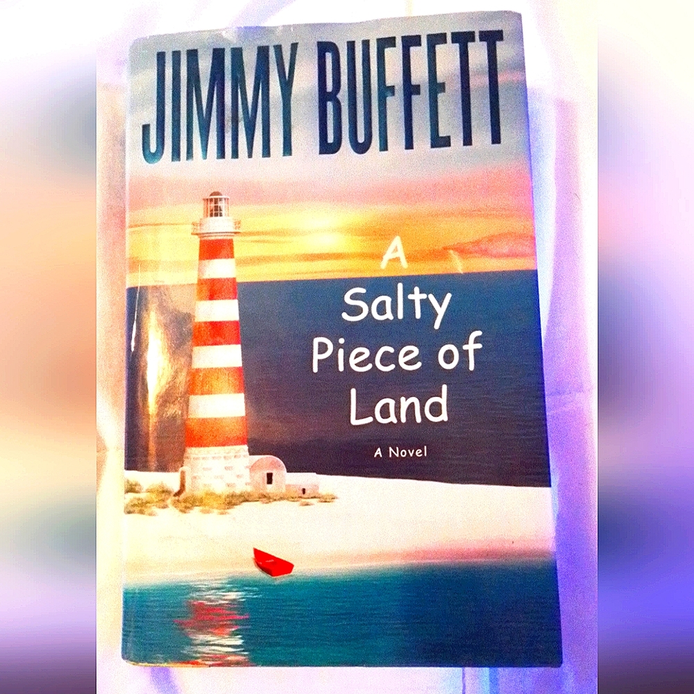 Hardback Book by Jimmy Buffett "A Salty Piece Of Land" a novel...